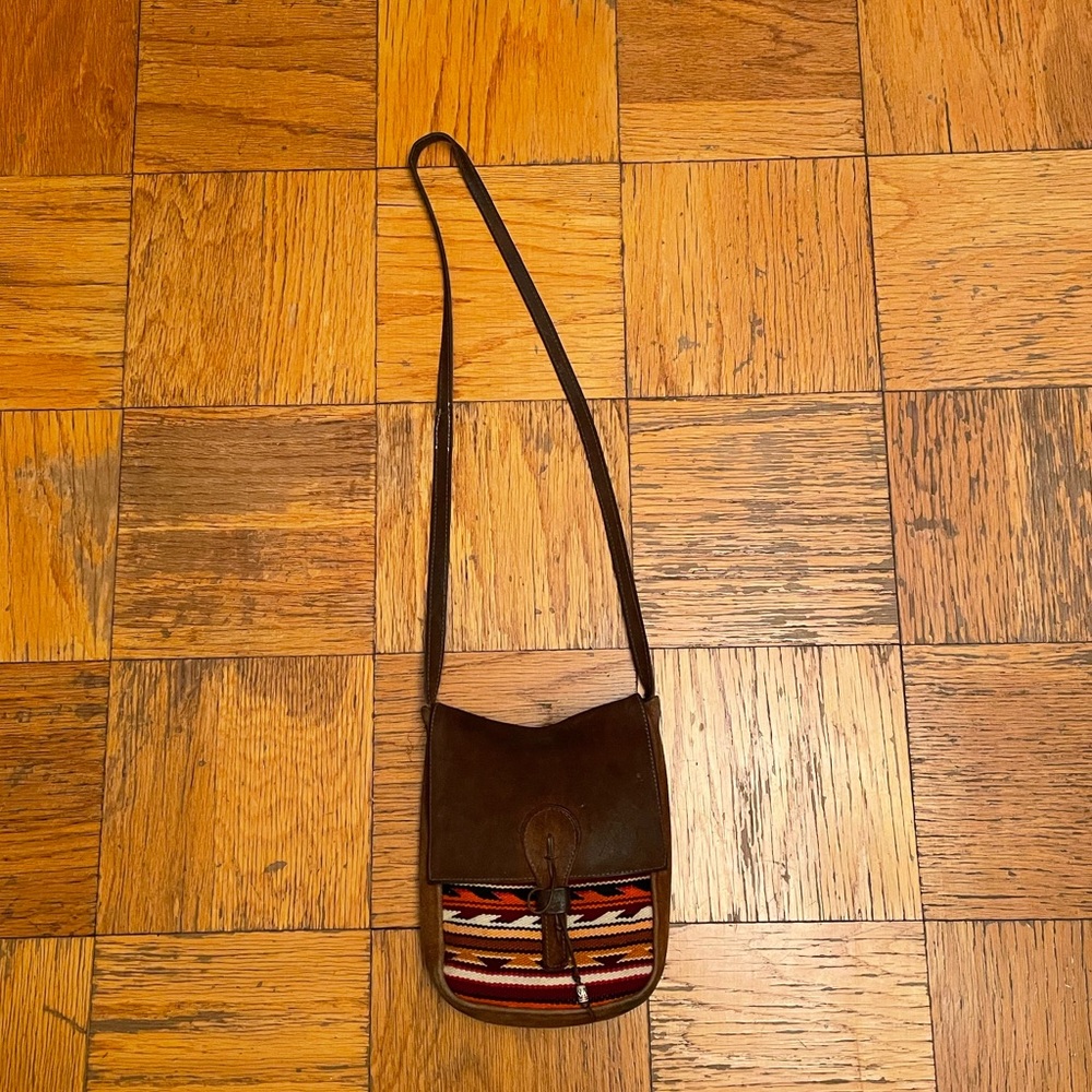 brown pocketbook with unique striped design